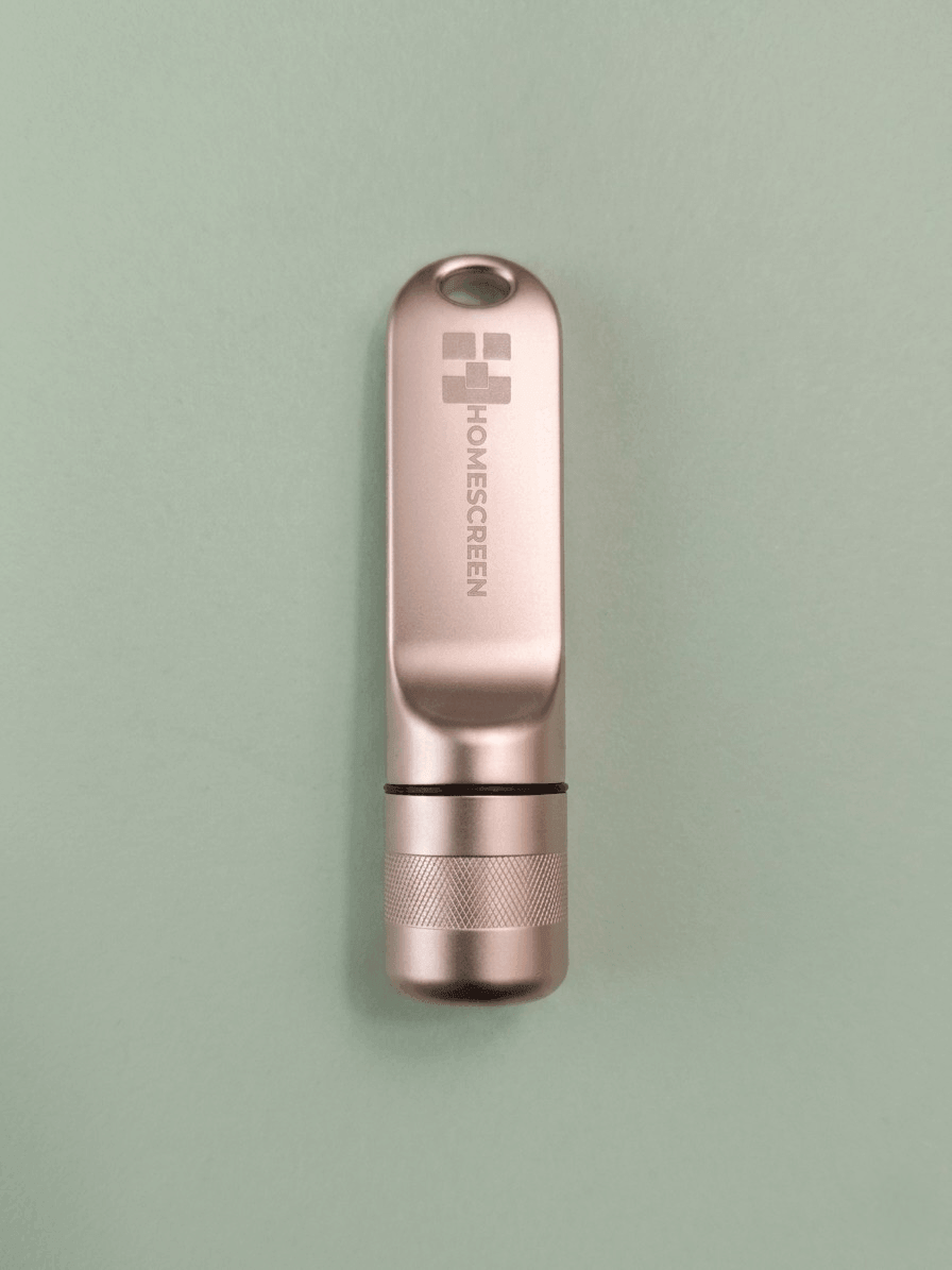 128GB portable USB drive with workspace on a mint green background.